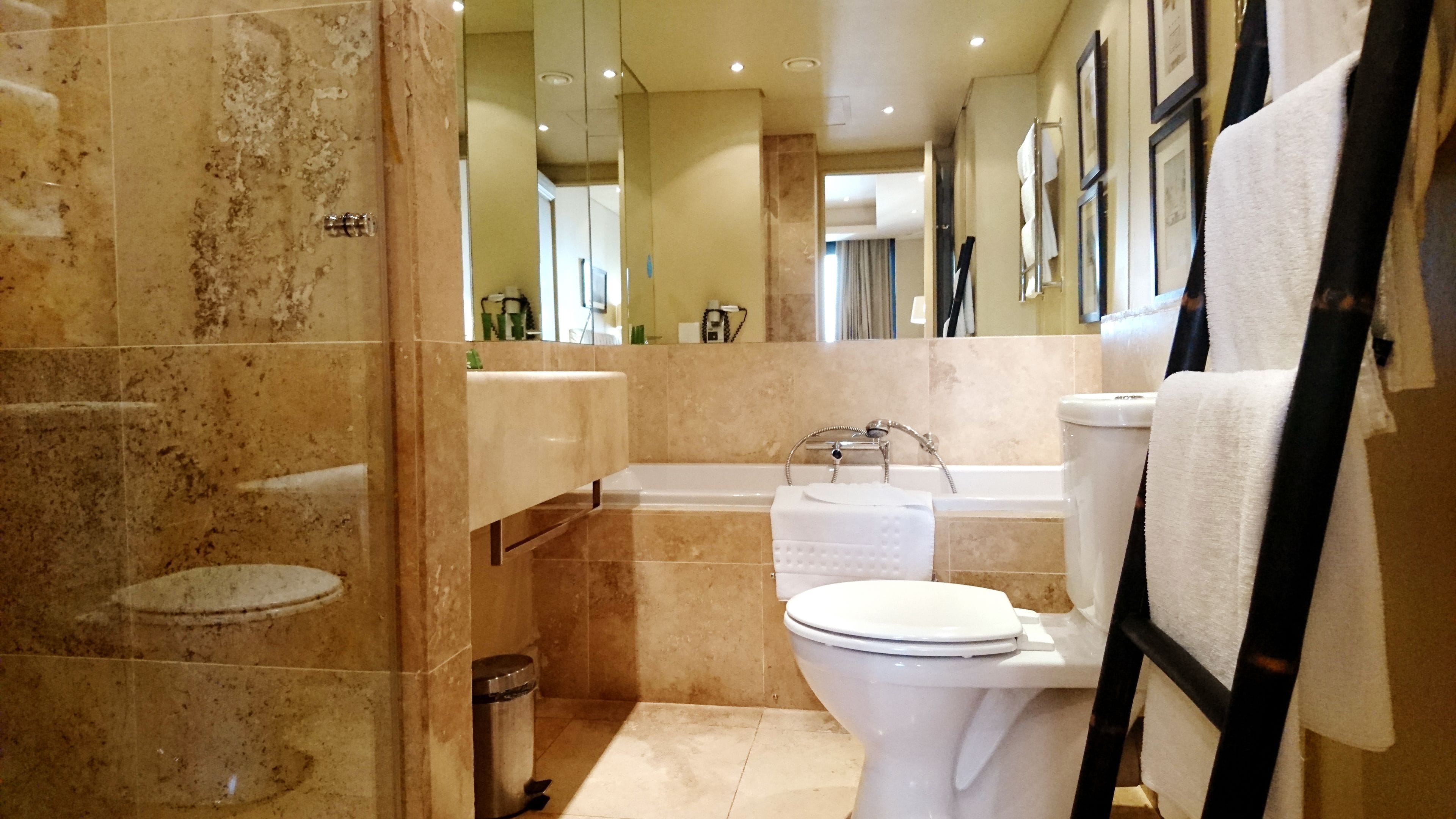 separate bathtub and shower, free toiletries, hair dryer, towels