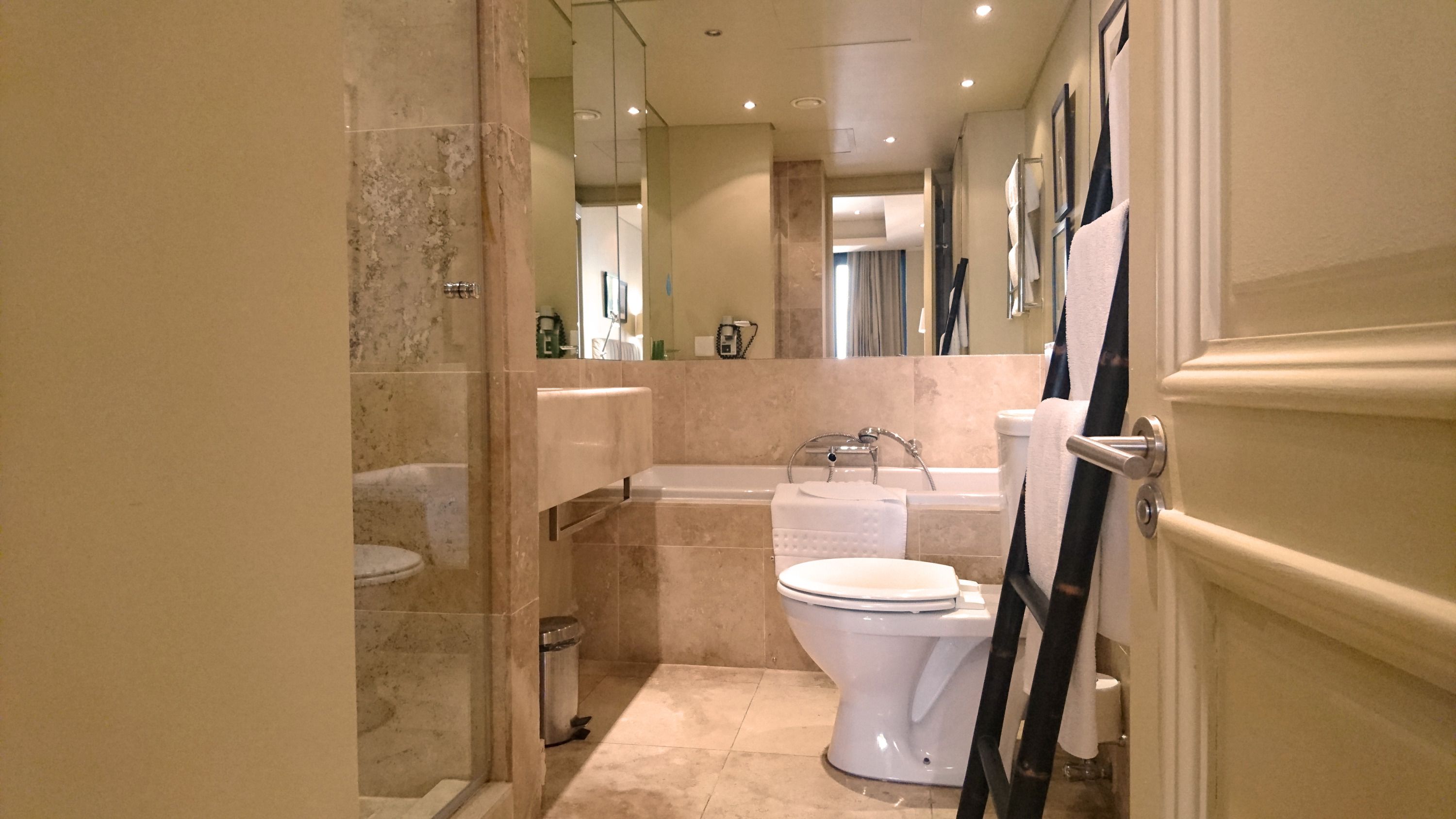 separate bathtub and shower, free toiletries, hair dryer, towels