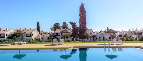 Outdoor pool, pool umbrellas, pool loungers