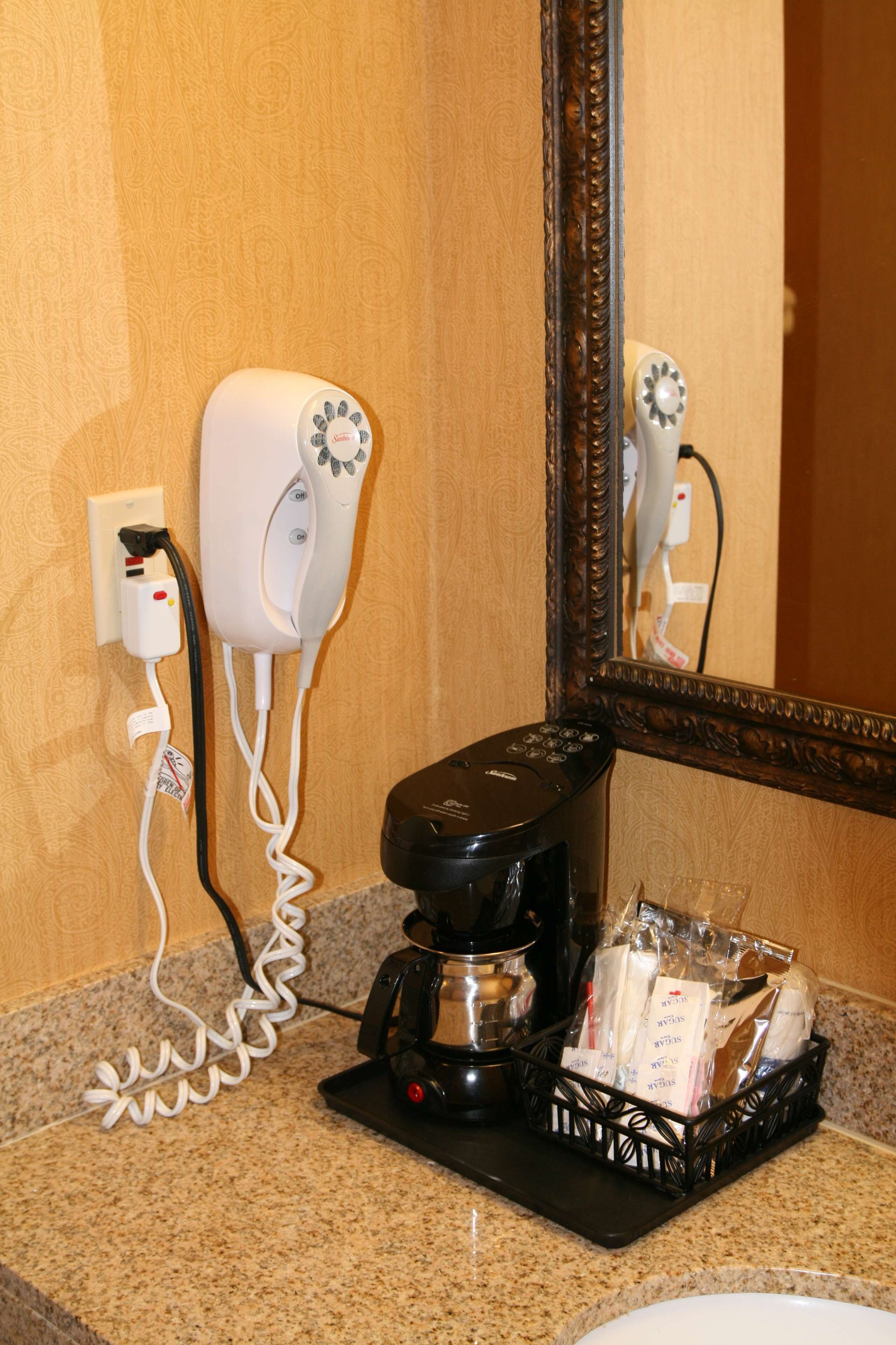 bathtub, hair dryer, towels