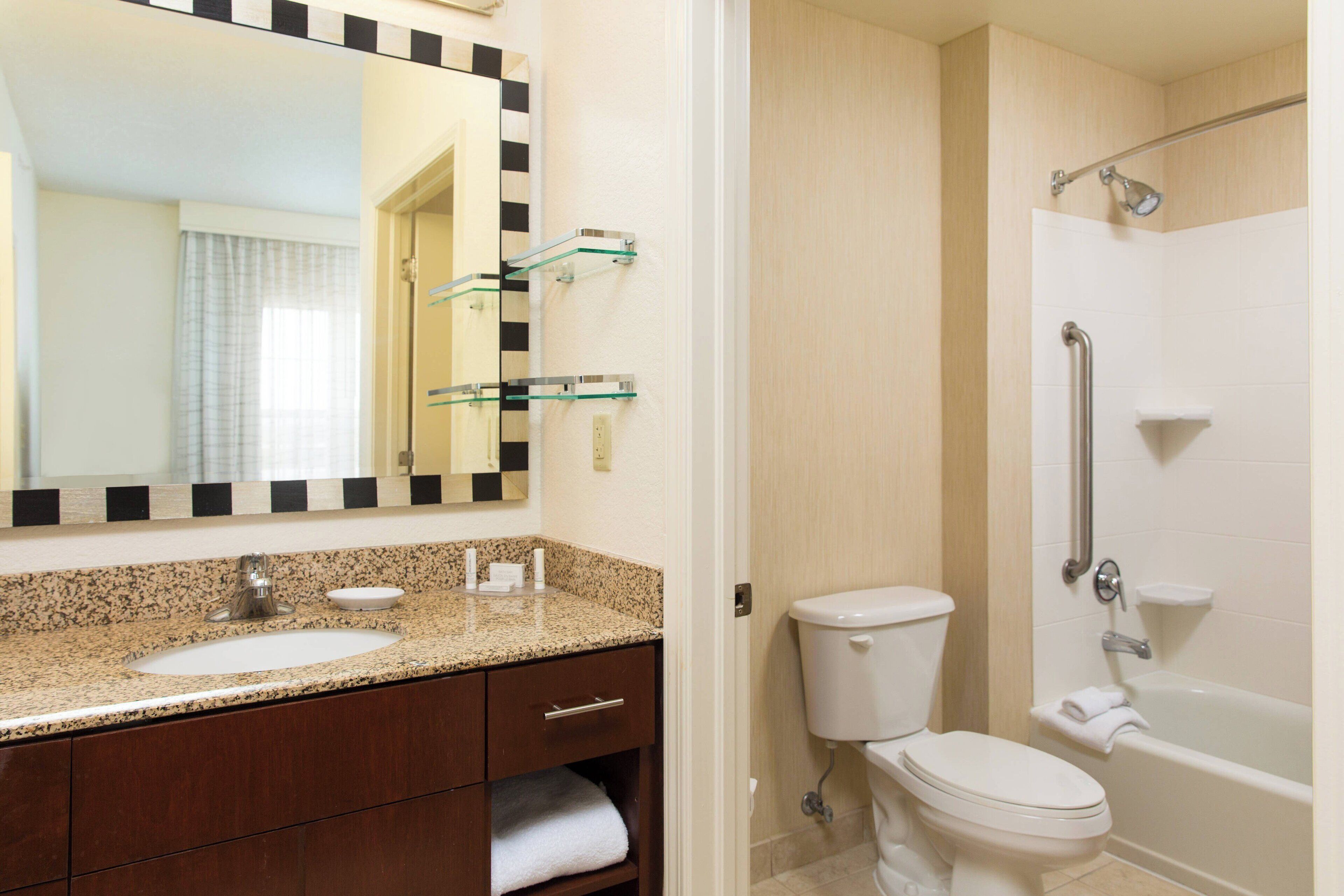 combined shower/bathtub, free toiletries, hair dryer, towels