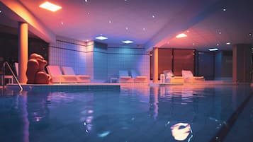 Indoor pool, pool umbrellas, pool loungers