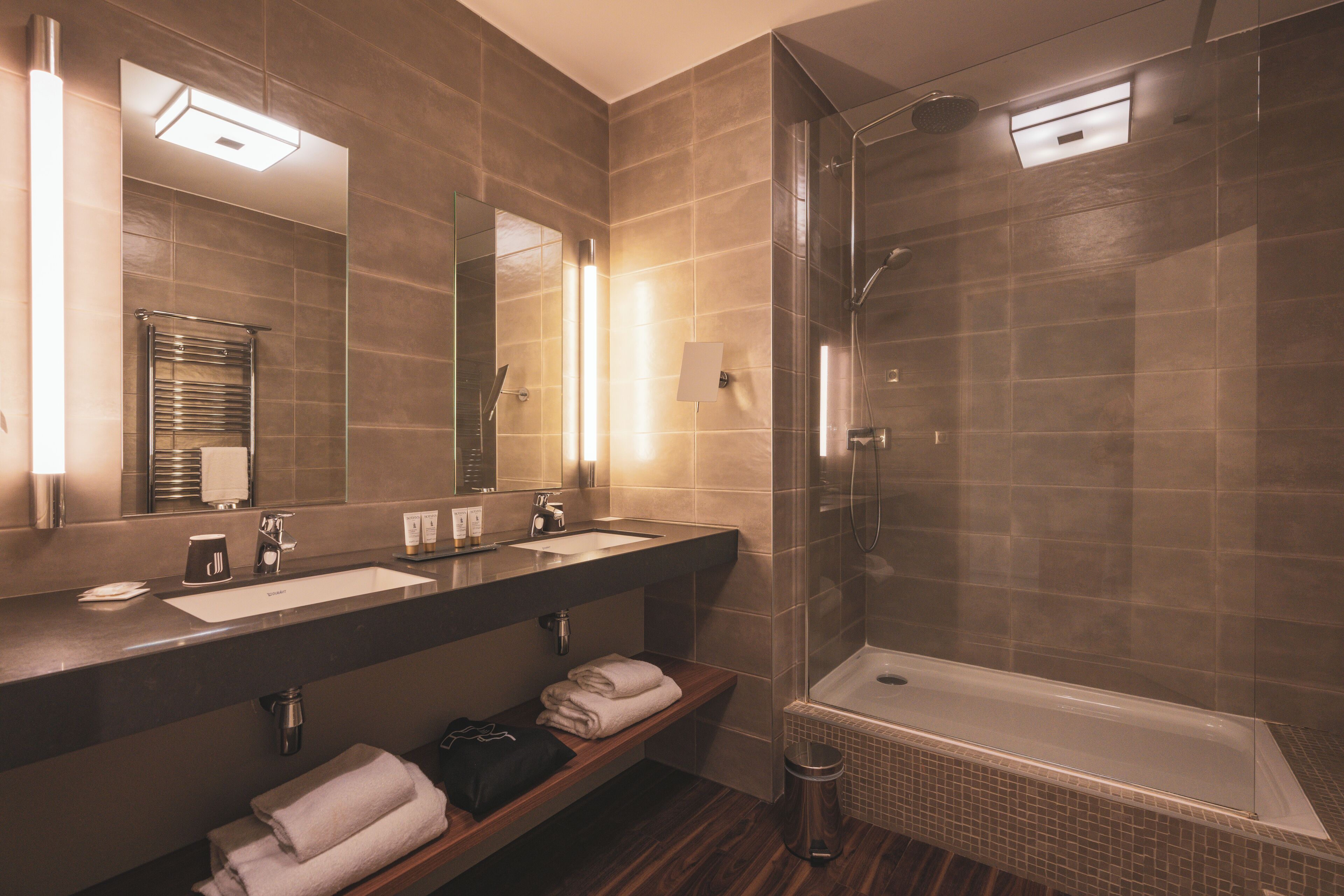 combined shower/bathtub, free toiletries, hair dryer, dressing gowns