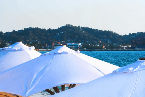 On the beach, beach umbrellas, beach towels