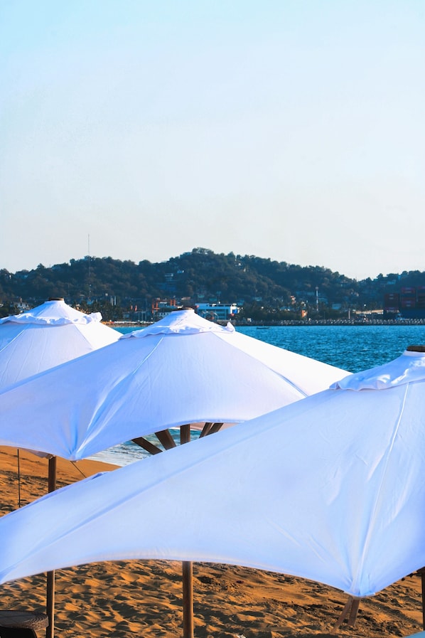 On the beach, beach umbrellas, beach towels