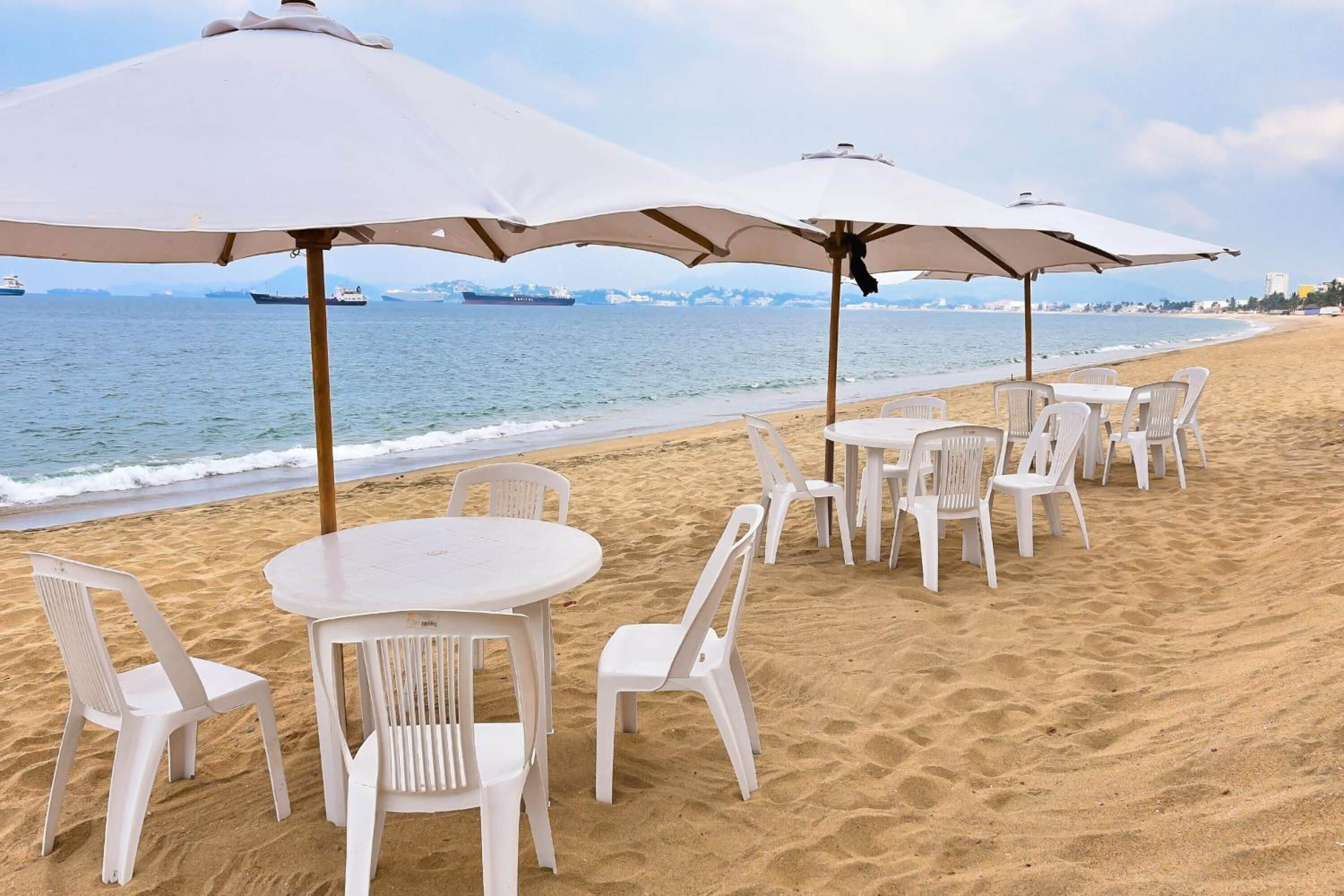 on the beach, beach umbrellas