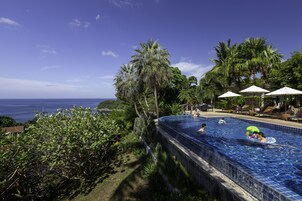 2 outdoor pools, open 7:00 AM to 7:00 PM, pool umbrellas, sun loungers