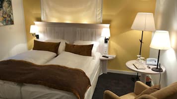 Ropa de cama de alta calidad, colchones con pillow-top y minibar