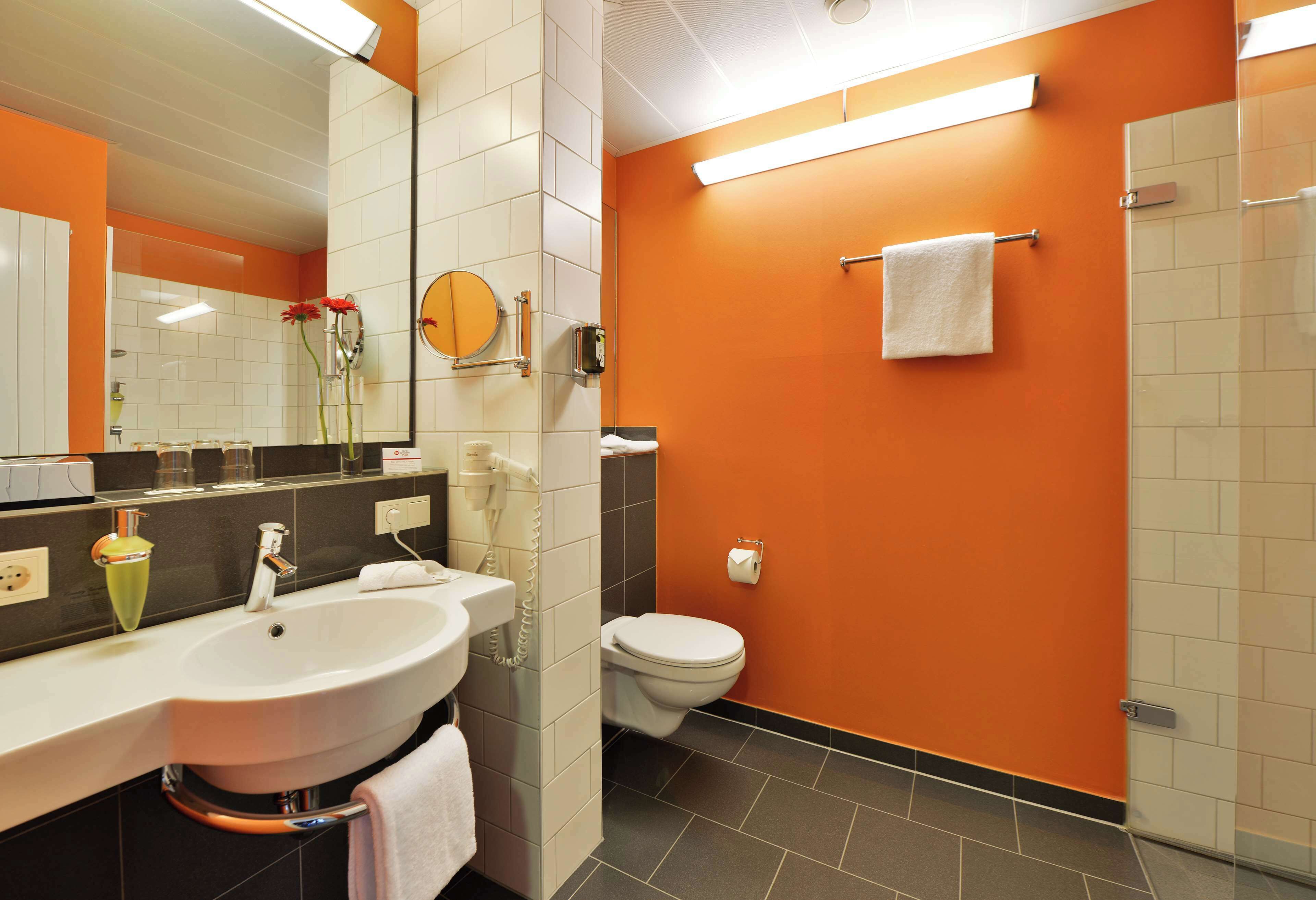 shower, hair dryer, bathrobes, towels