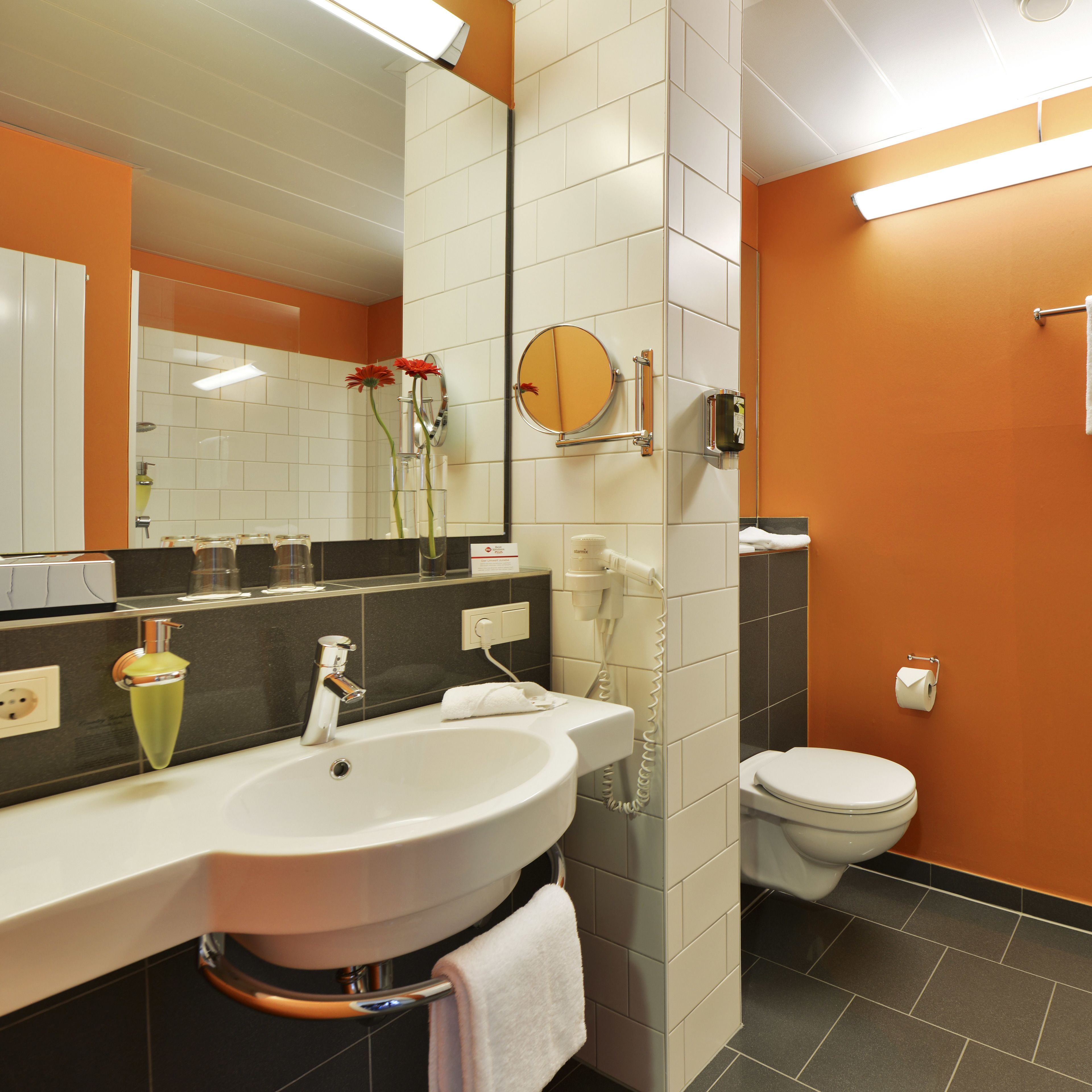 shower, hair dryer, bathrobes, towels