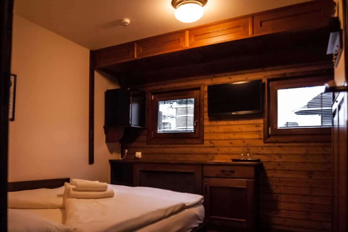 Standard Double Room, River View | Minibar, blackout drapes, iron/ironing board, free cribs/infant beds