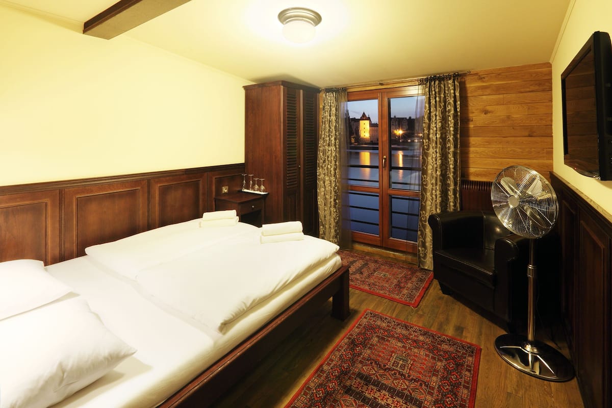 Superior Double Room, River View | Minibar, blackout drapes, iron/ironing board, free cribs/infant beds