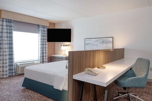 Coffres-forts dans les chambres, fer et planche à repasser