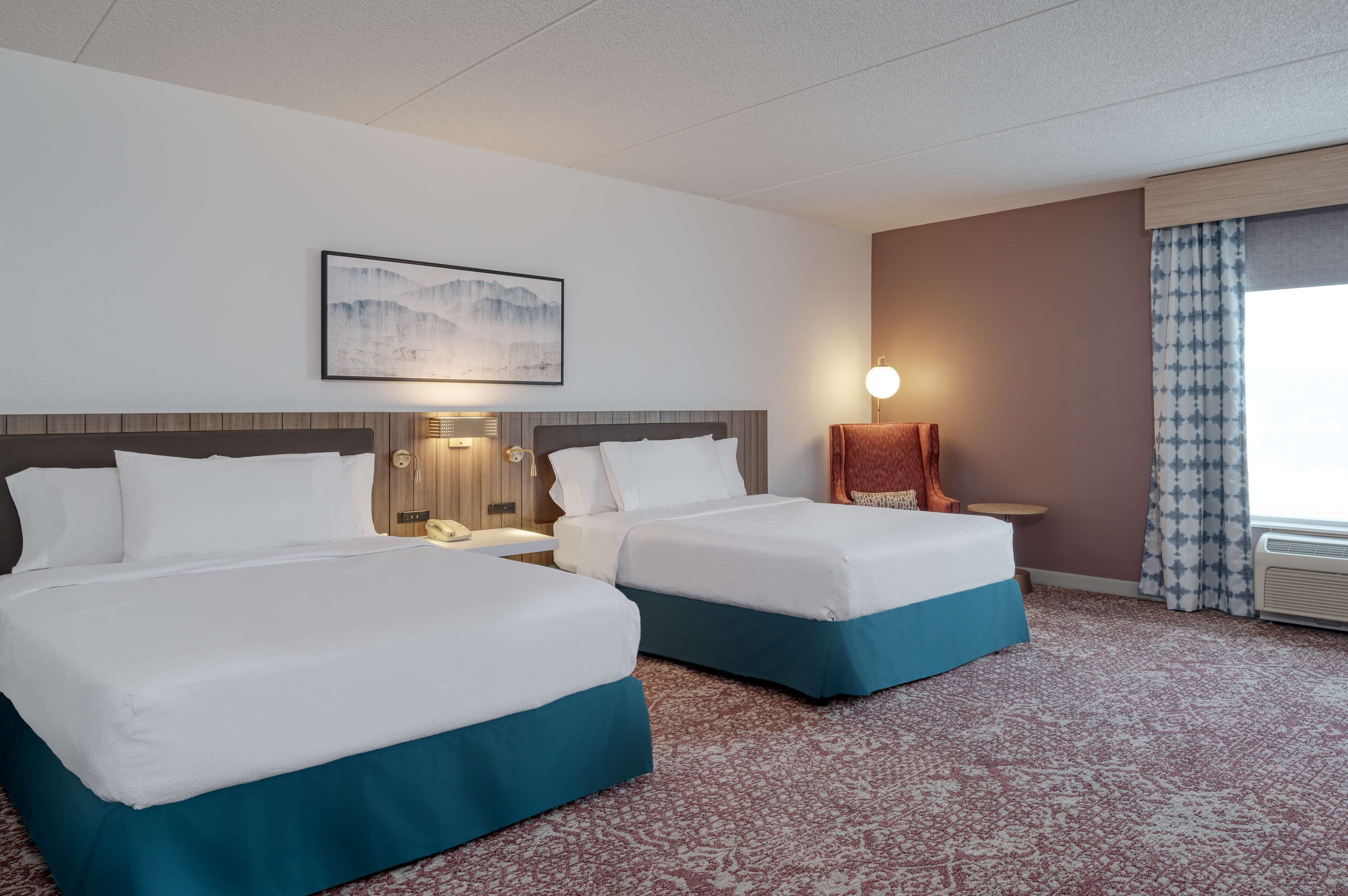 room, 2 queen beds, accessible | in-room safe, iron/ironing board, free cots/infant beds, free wifi