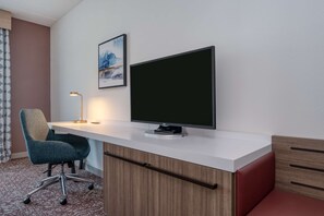 Coffres-forts dans les chambres, fer et planche à repasser