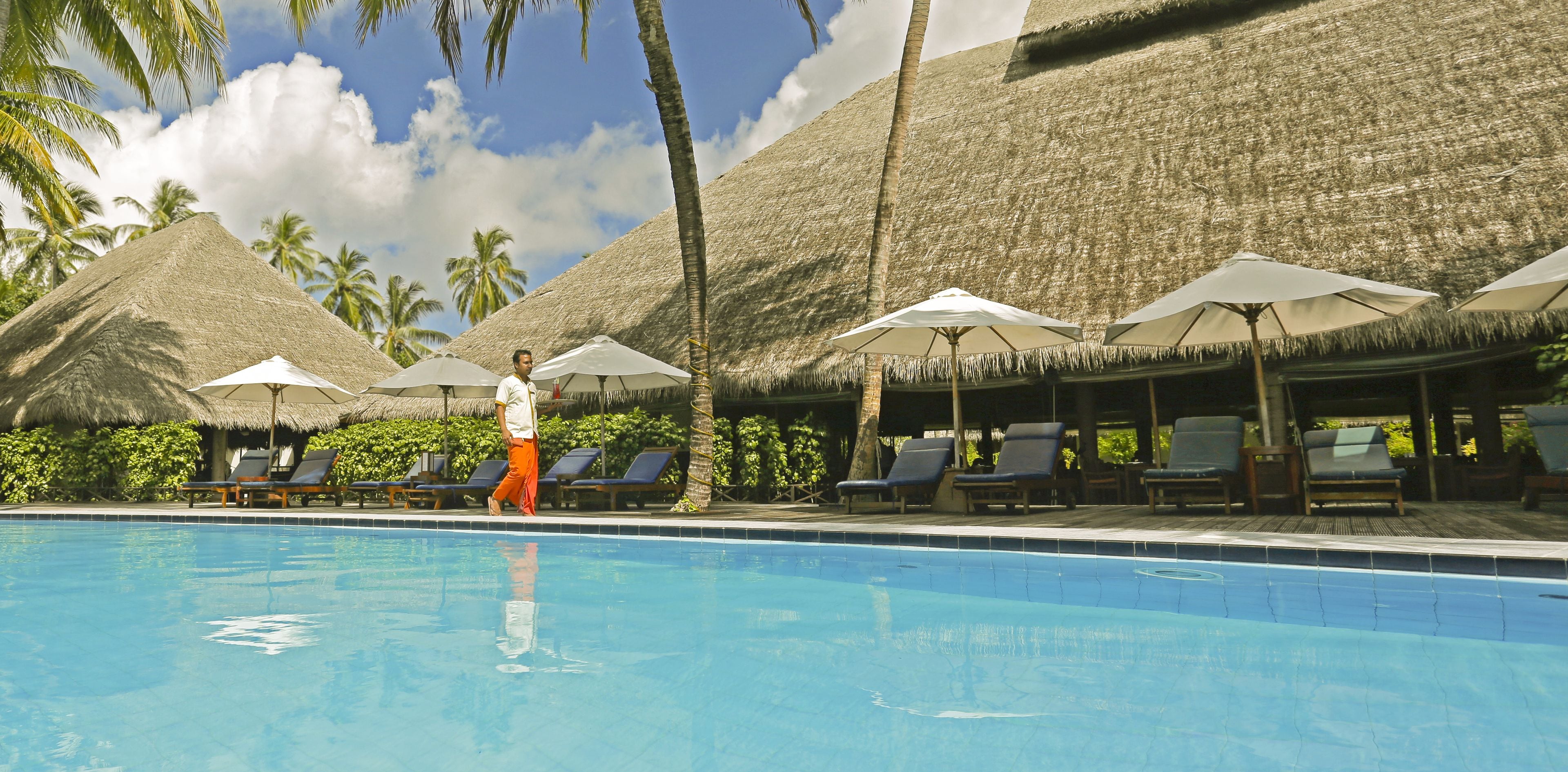 outdoor pool, pool umbrellas, pool loungers