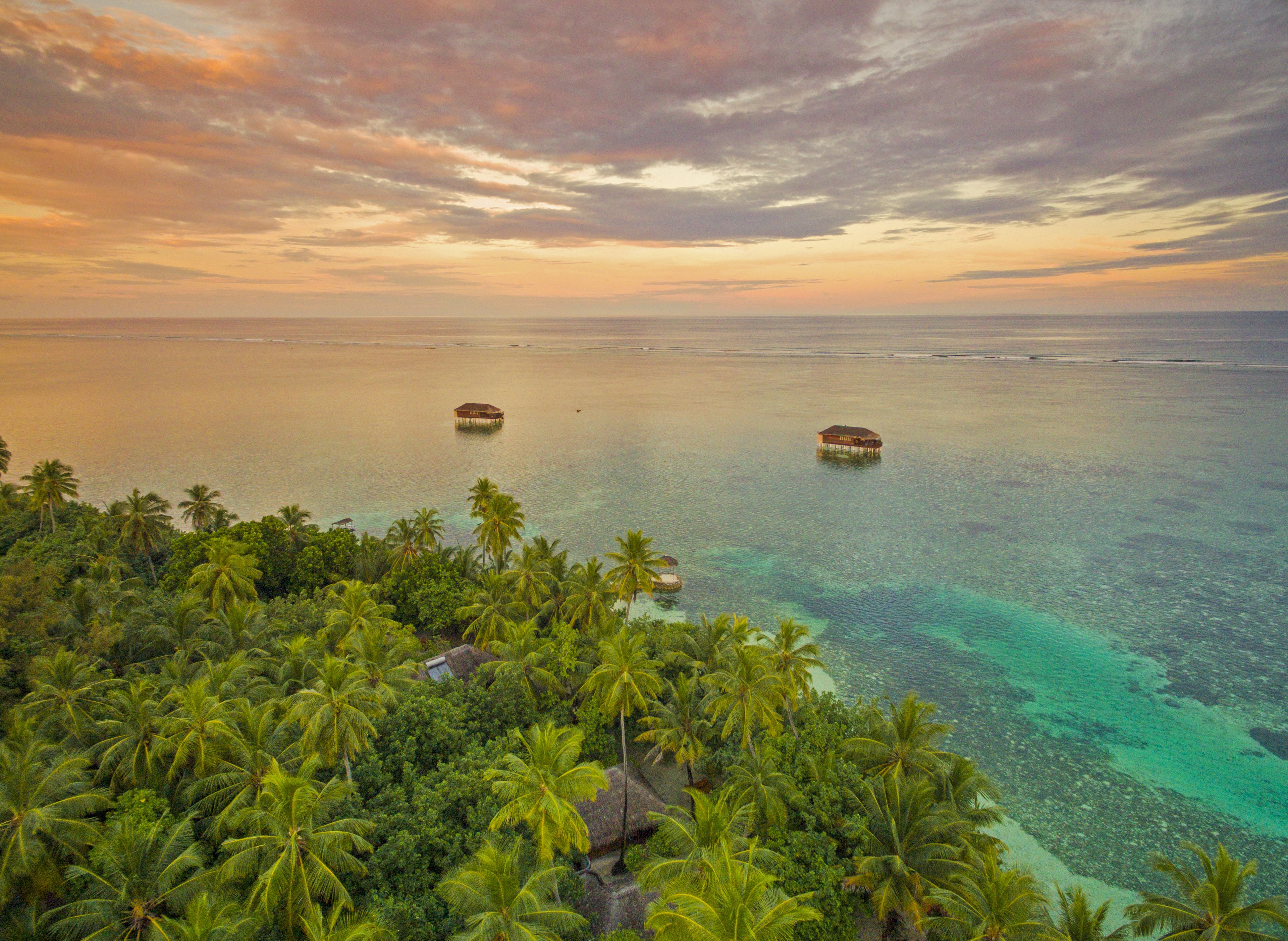 private beach, white sand, sun-loungers, beach umbrellas
