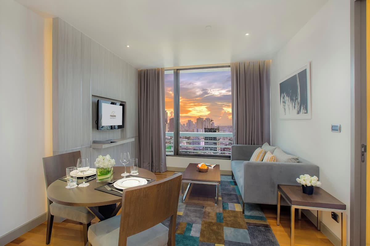 Family Apartment, 3 Bedrooms, Balcony | Living area | 43-inch LED TV with cable channels, TV