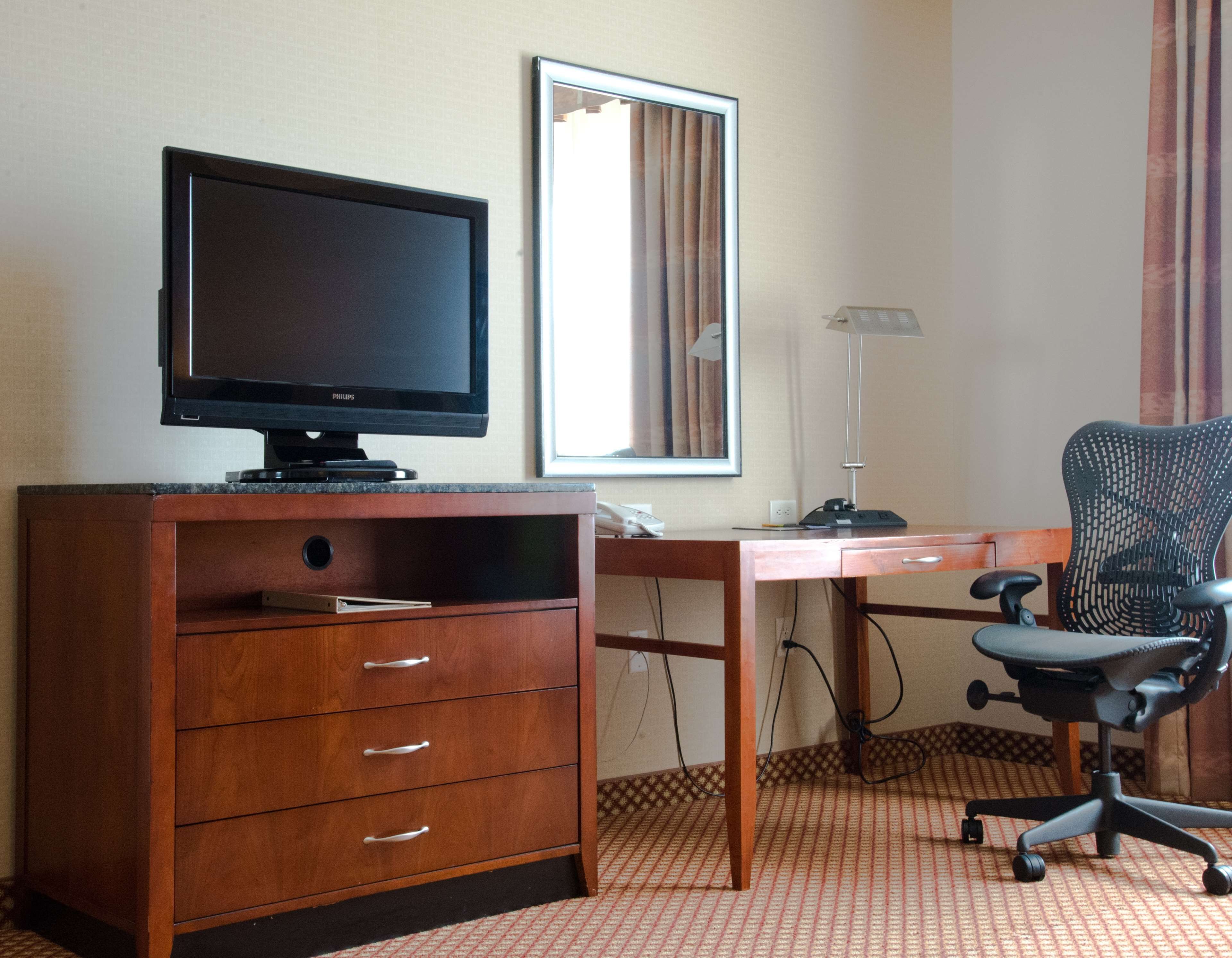 hypo-allergenic bedding, down duvets, desk, blackout curtains