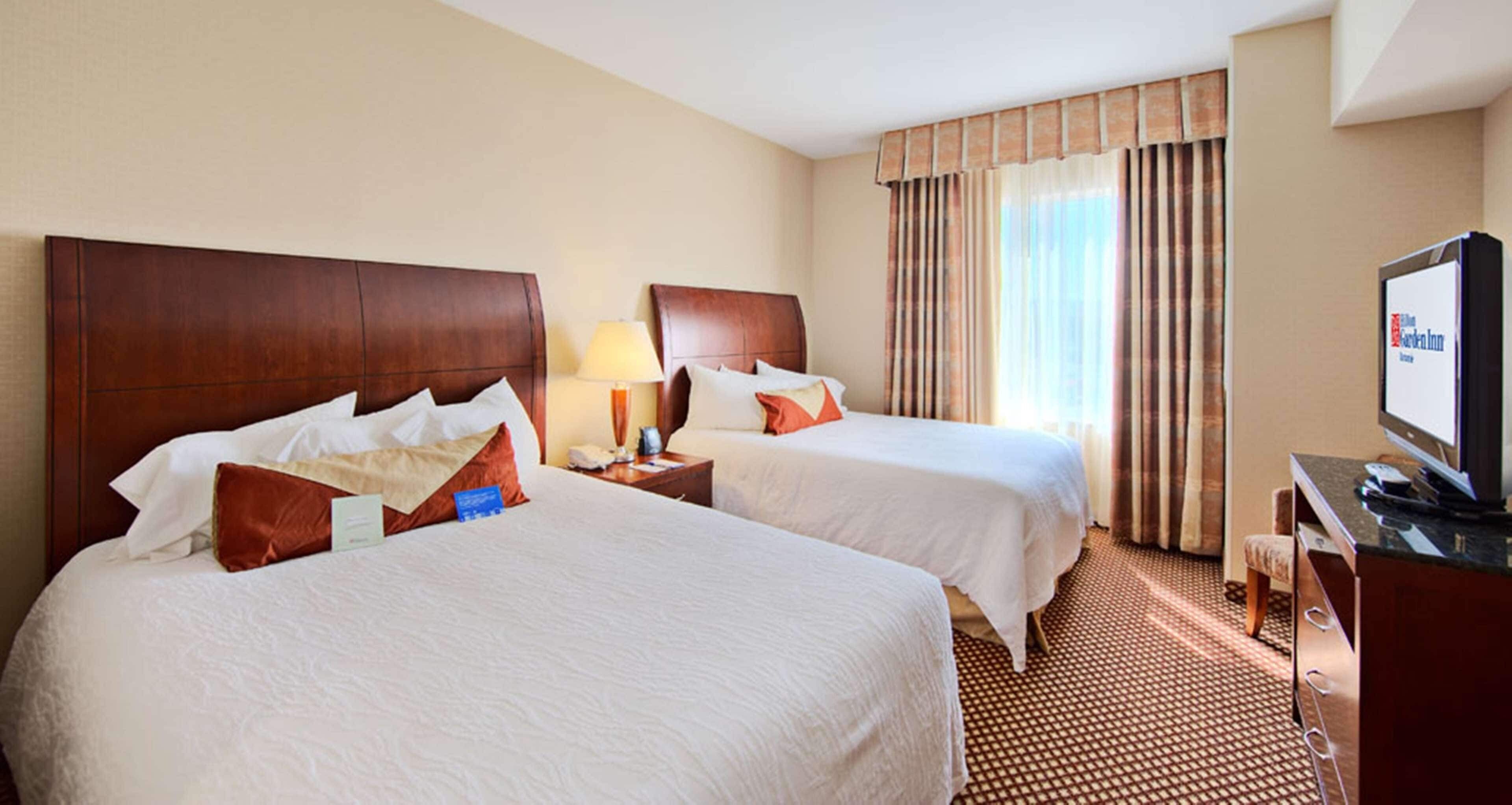 Hypo-allergenic bedding, down comforters, desk, blackout drapes