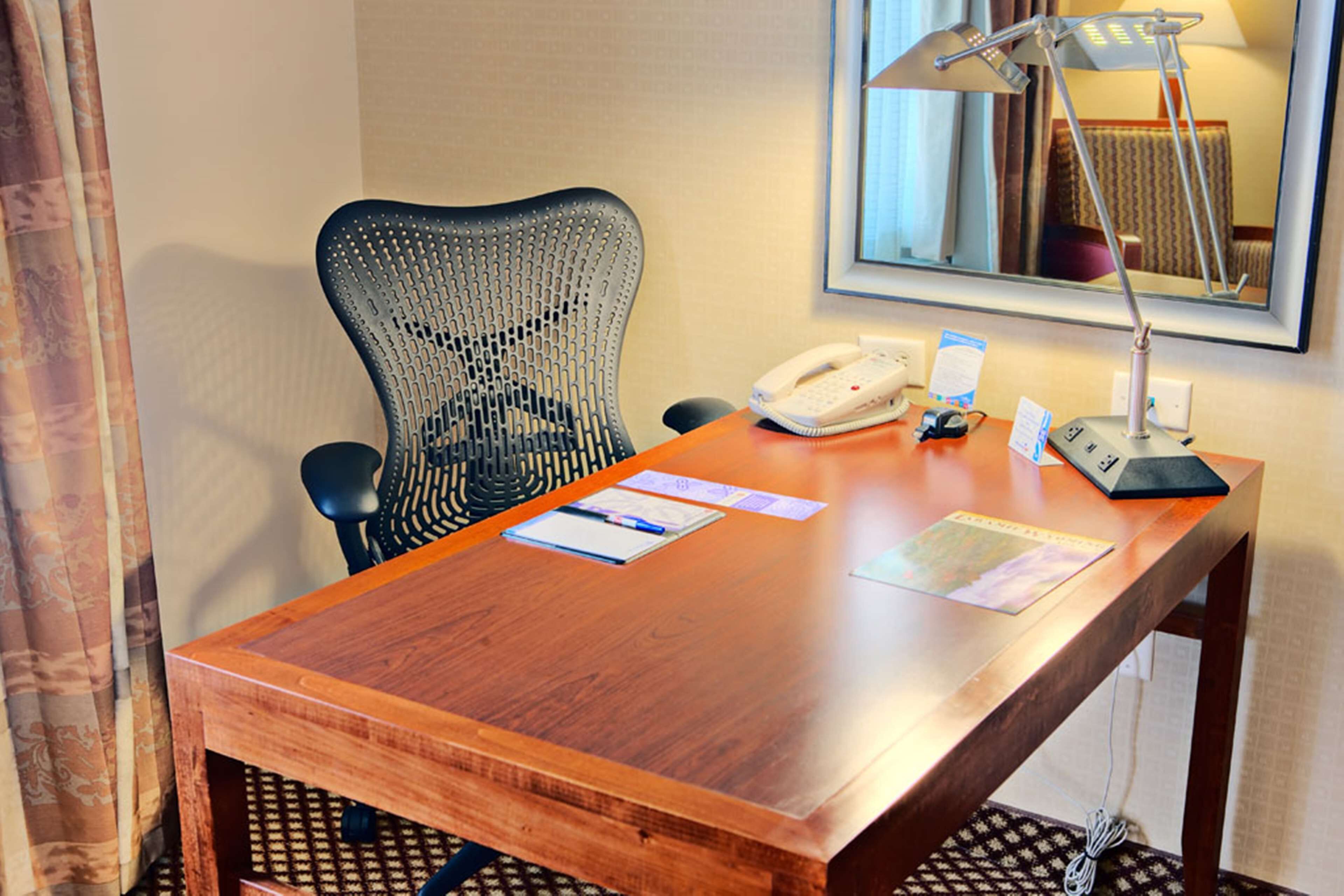 hypo-allergenic bedding, down duvets, desk, blackout curtains