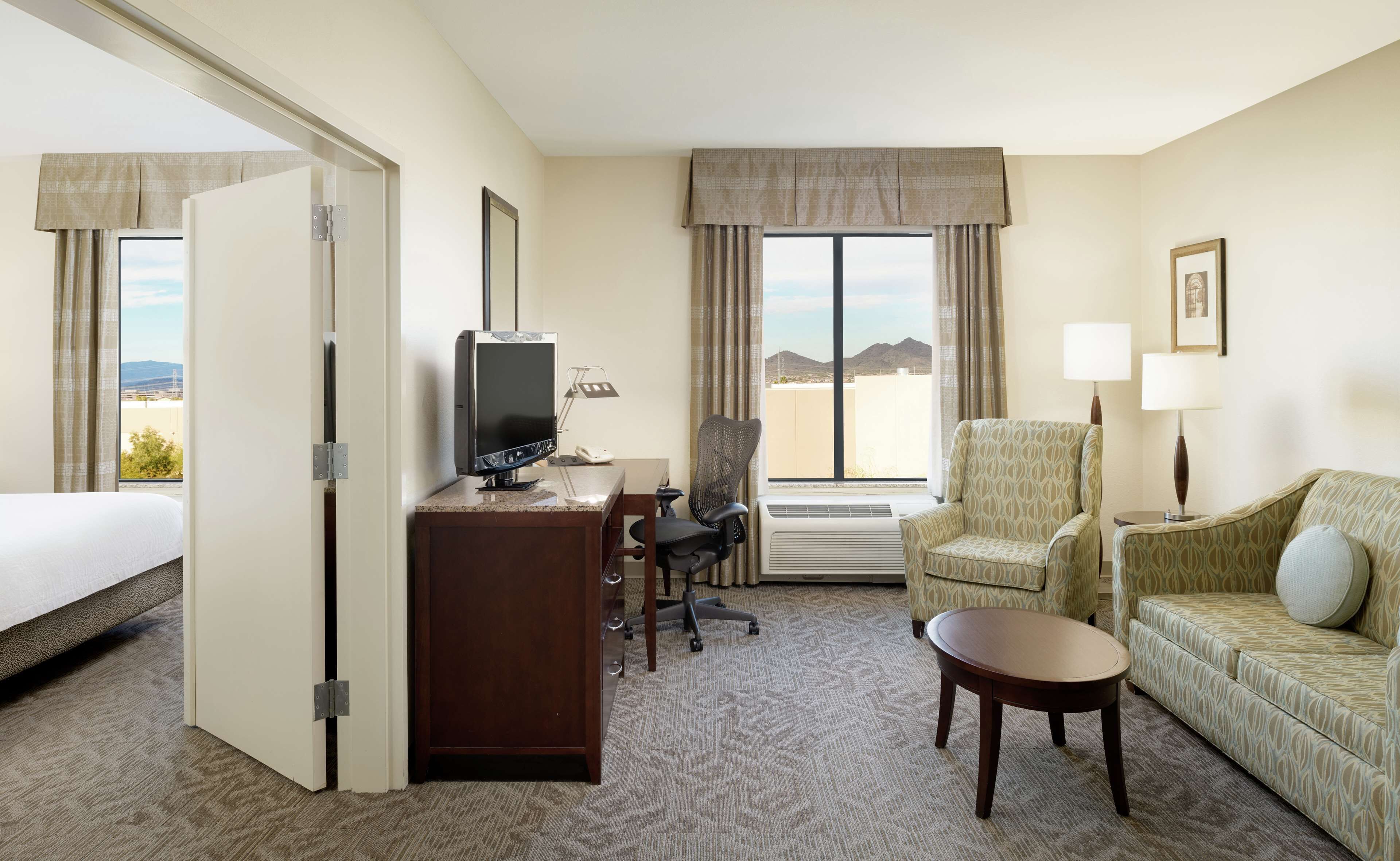 1 king bed deluxe suite | premium bedding, in-room safe, desk, laptop workspace