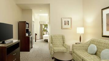 Suite junior, 1 cama King size | Ropa de cama de alta calidad y caja de seguridad en la habitación