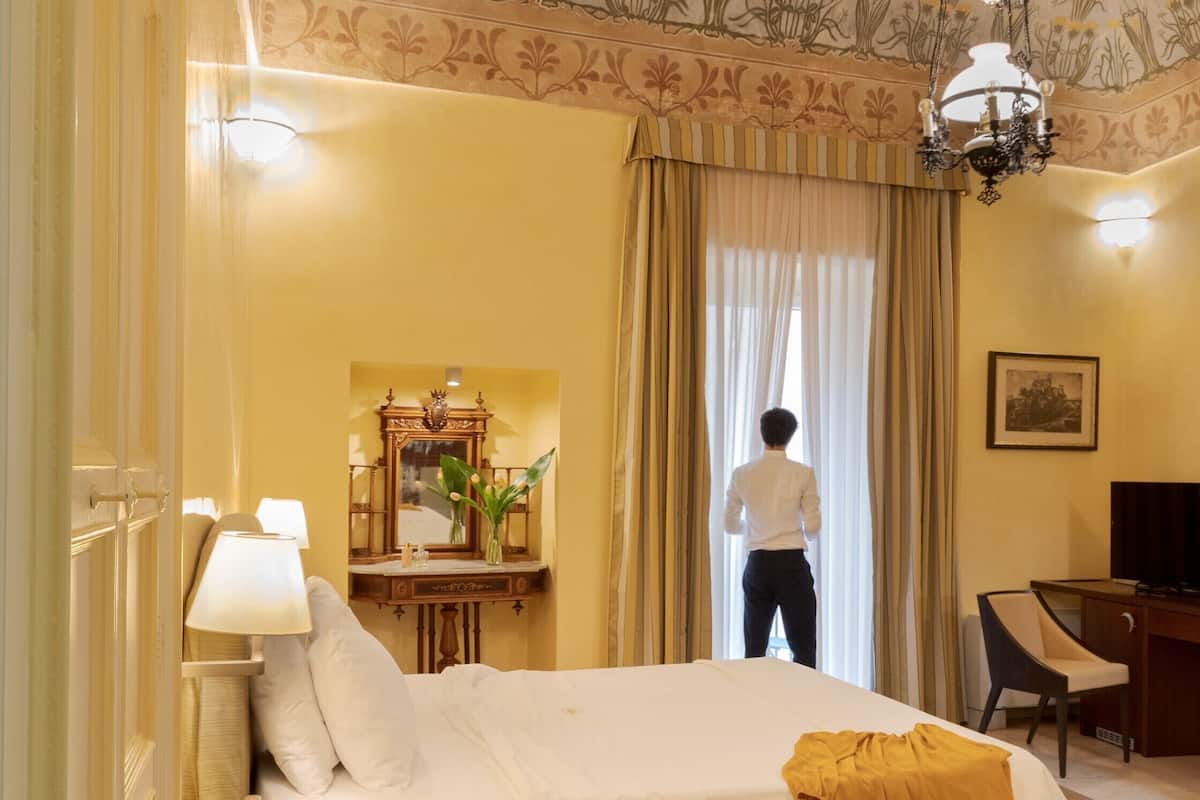 junior suite, 1 king bed, balcony, partial sea view | premium bedding, down duvets, minibar, in-room safe