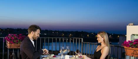 Rooftop bar, ocean views, open daily