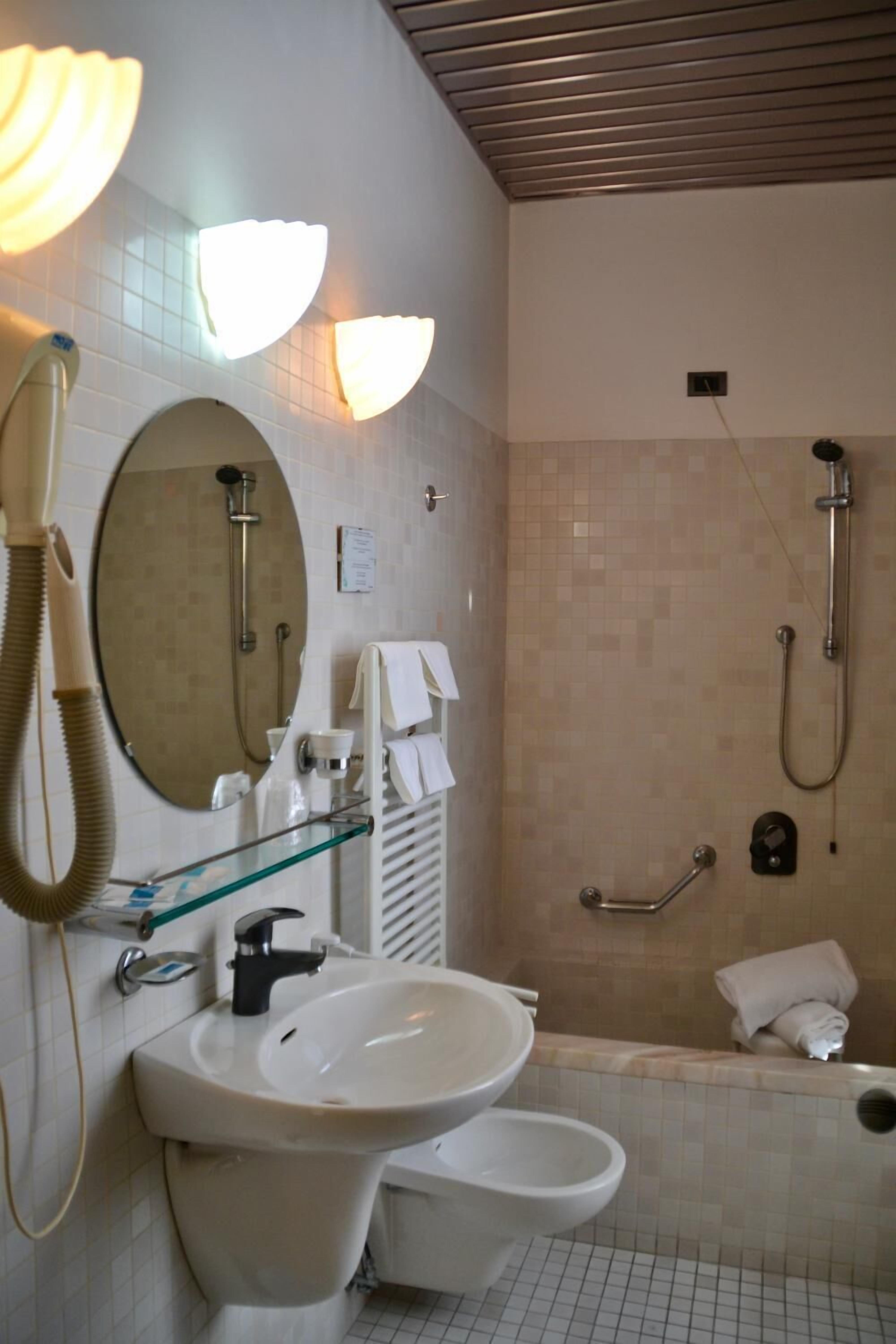 free toiletries, hair dryer, bidet, towels