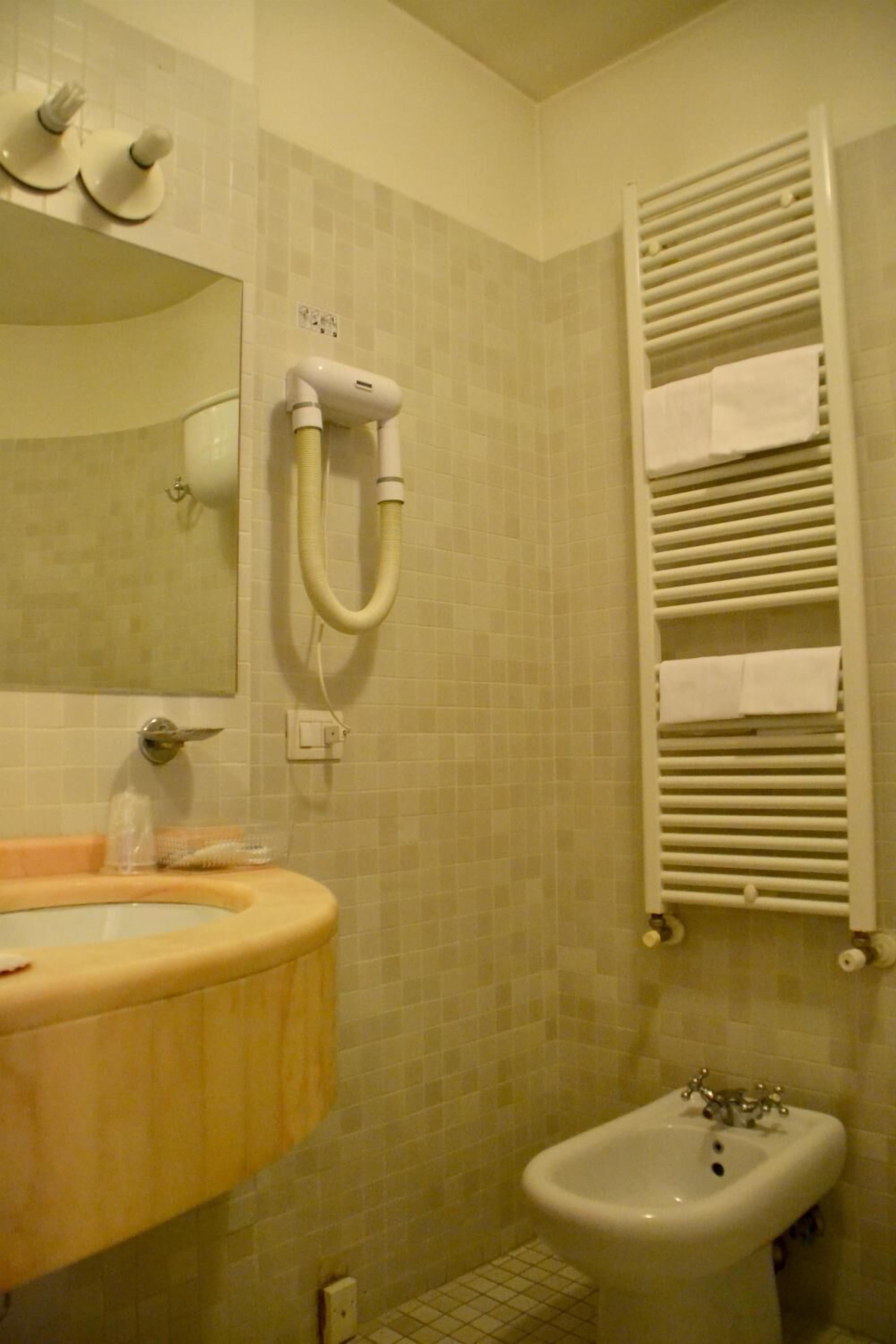 free toiletries, hair dryer, bidet, towels