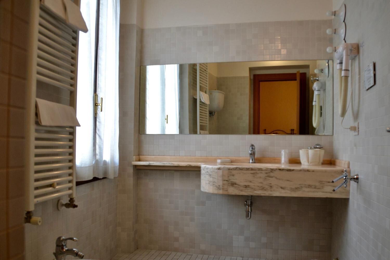 free toiletries, hair dryer, bidet, towels