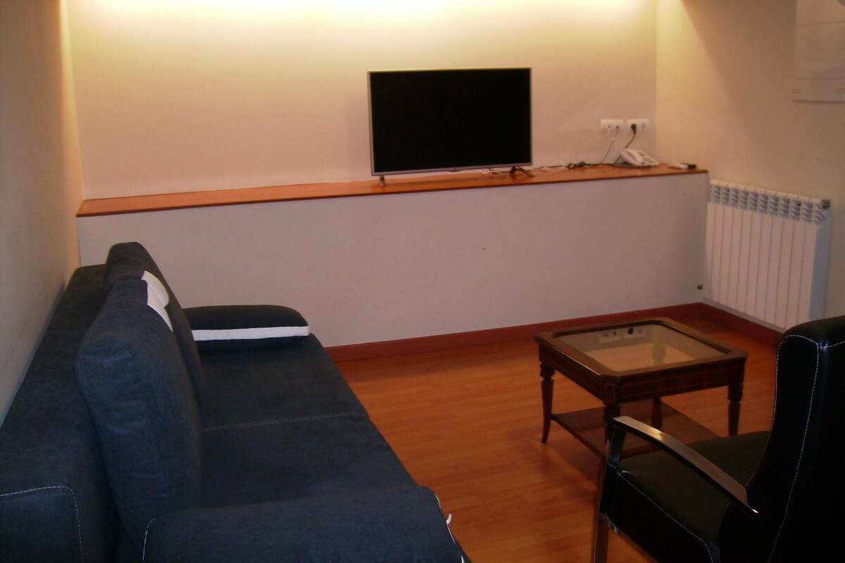 Suite | Living room | 22-inch flat-screen TV with digital channels, TV
