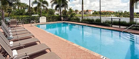 Outdoor pool, pool umbrellas, sun loungers