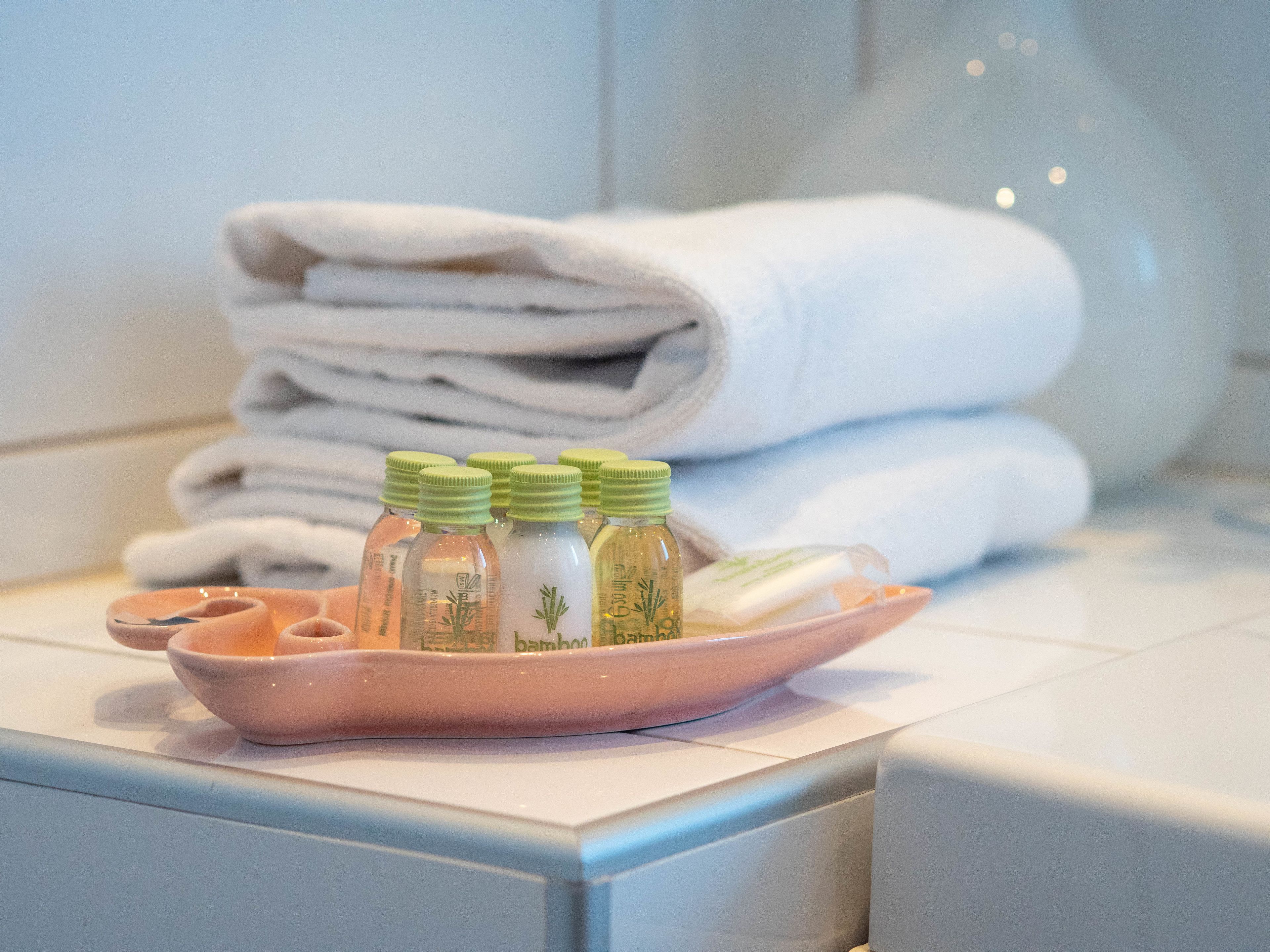 designer toiletries, hair dryer, heated floors, towels