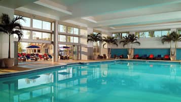 Indoor pool, open 8:00 AM to 10:00 PM, pool umbrellas, pool loungers