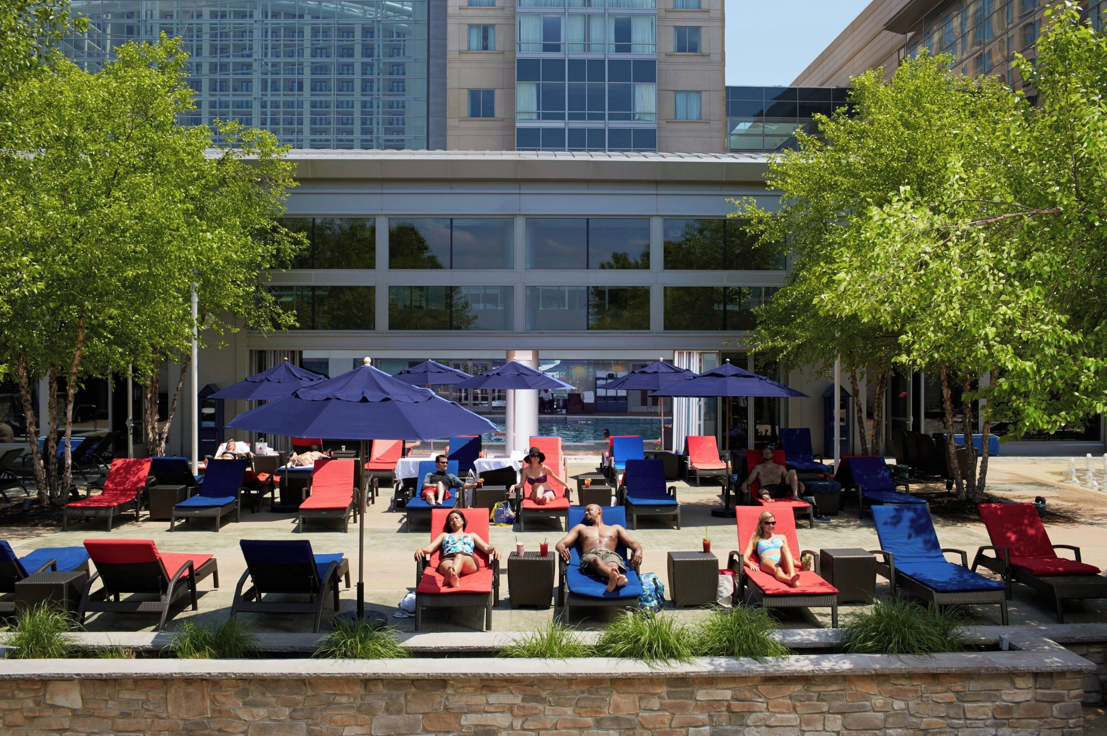 indoor pool, open 8:00 am to 10:00 pm, pool umbrellas, pool loungers