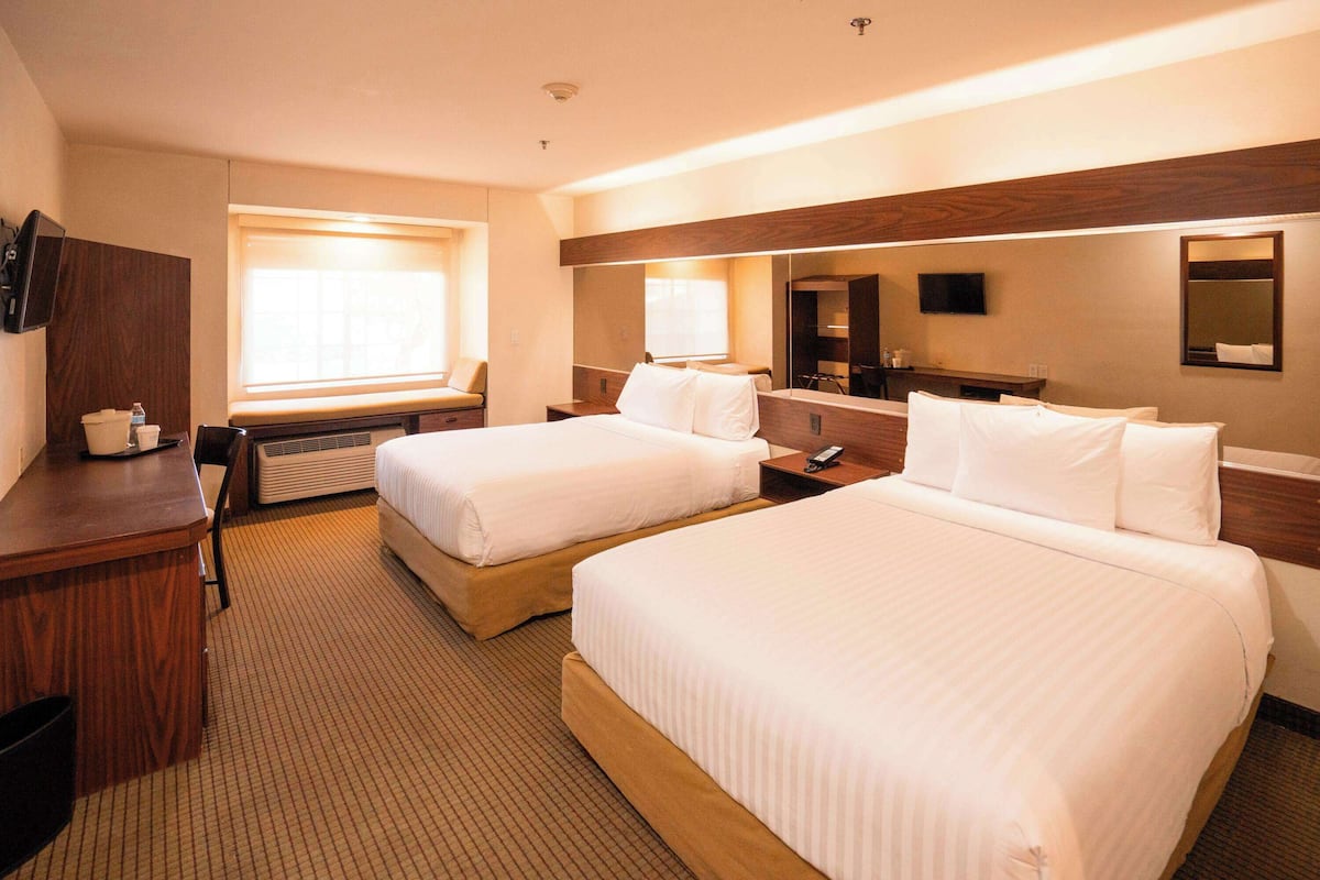 standard room, 2 queen beds, accessible | in-room safe, desk, iron/ironing board, free cots/infant beds