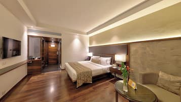 1 habitación, cubrecamas, minibar y caja de seguridad en la habitación