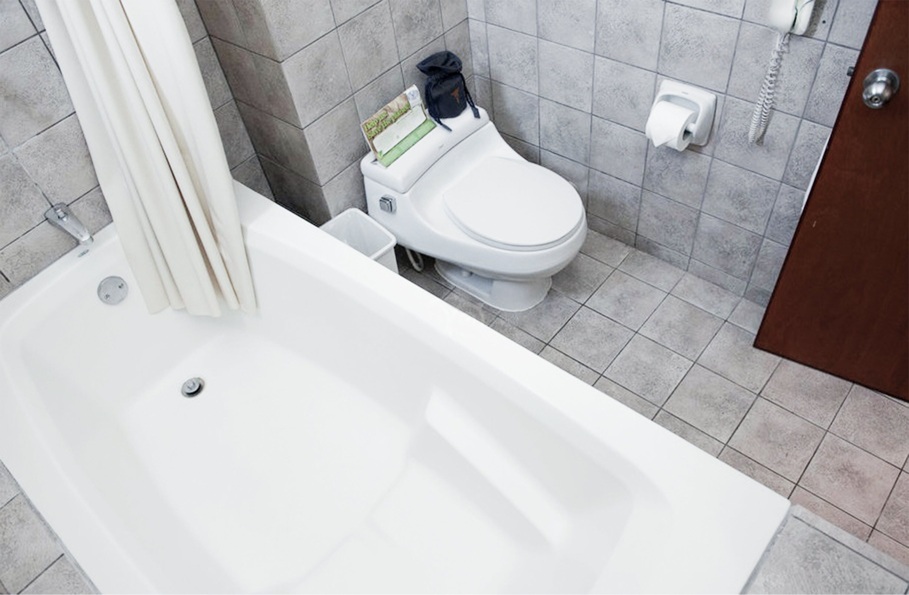 suite, 1 queen bed | bathroom | hair dryer, towels