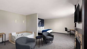 Suite, 1 King Bed | Desk, blackout drapes, iron/ironing board, free WiFi