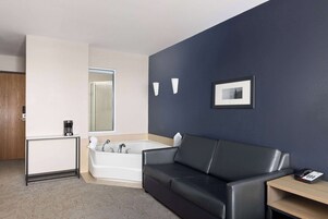 Suite, 1 King Bed with Sofa bed, Non Smoking | Desk, blackout drapes, iron/ironing board, free WiFi