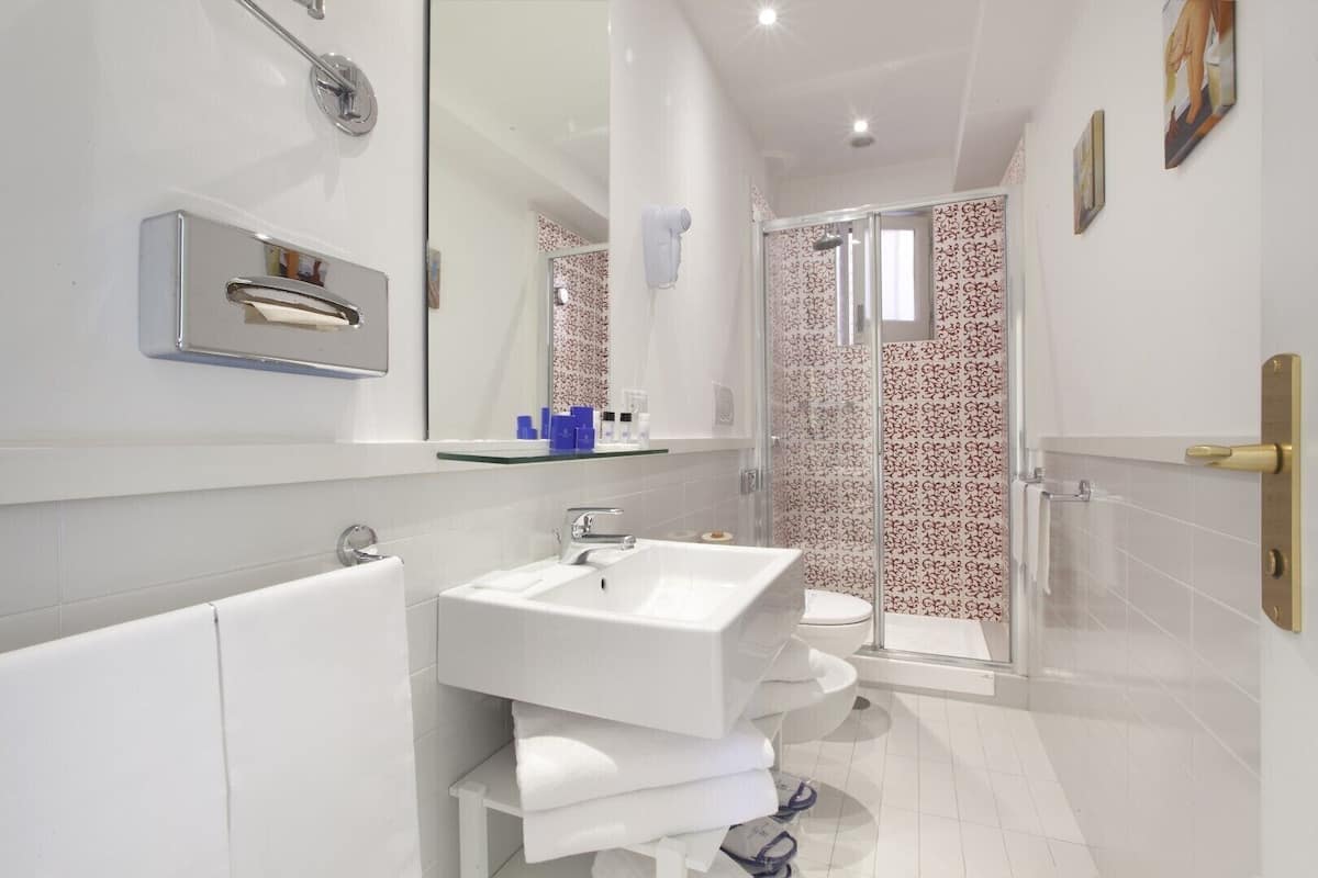 Family Quadruple Room, Multiple Beds, Patio | Bathroom