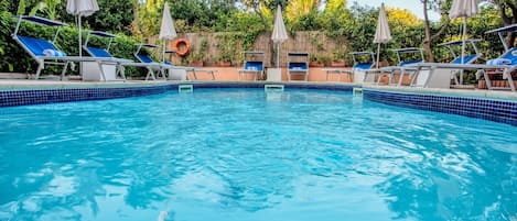 Seasonal outdoor pool, pool umbrellas, sun loungers