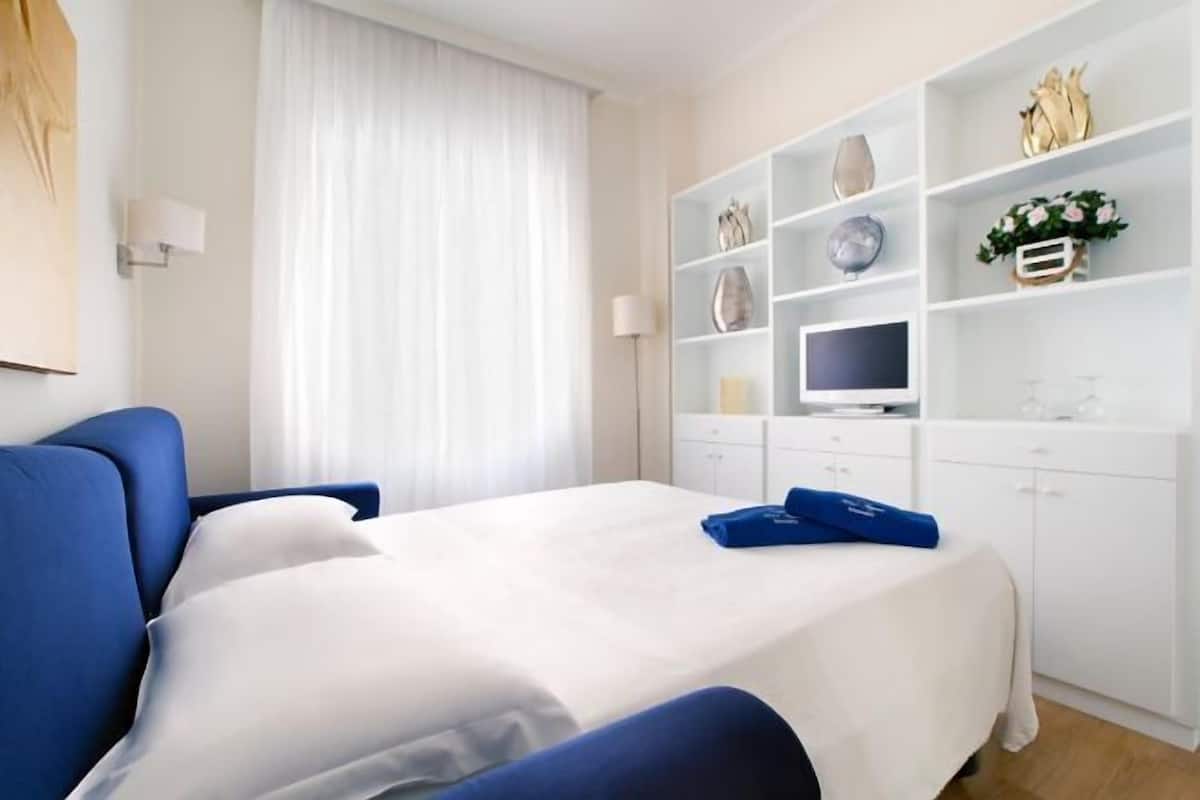 Premium bedding, down duvets, minibar, in-room safe