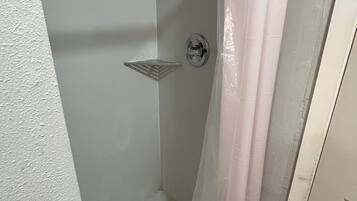 Basic Room, 1 Queen Bed | Bathroom | Combined shower/tub, deep soaking tub, free toiletries, hair dryer