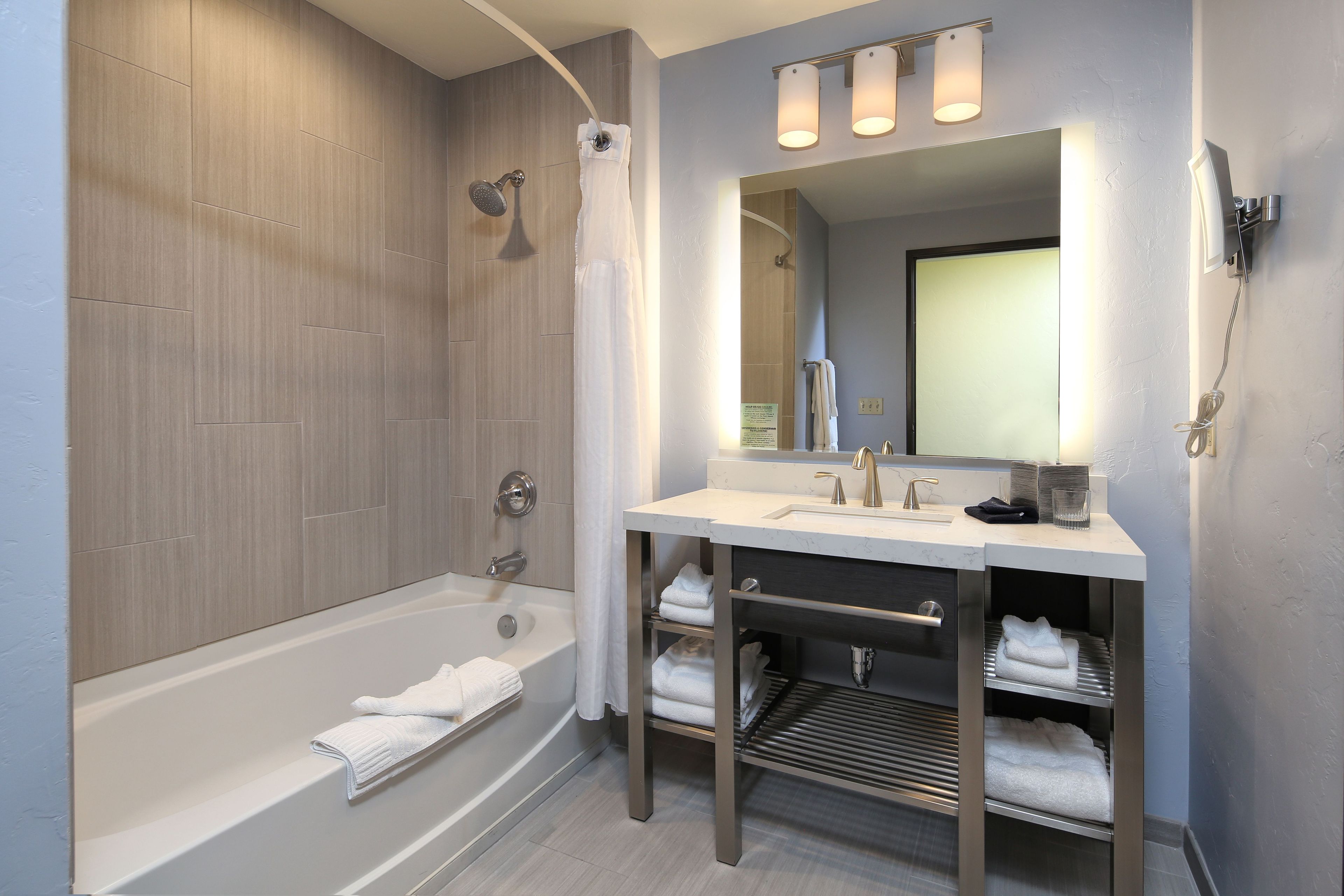 deluxe room, 2 queen beds | bathroom | free toiletries, hair dryer, towels