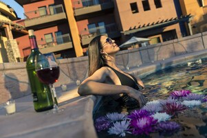 Outdoor pool, open 6:00 AM to 10:00 PM, pool umbrellas, sun loungers