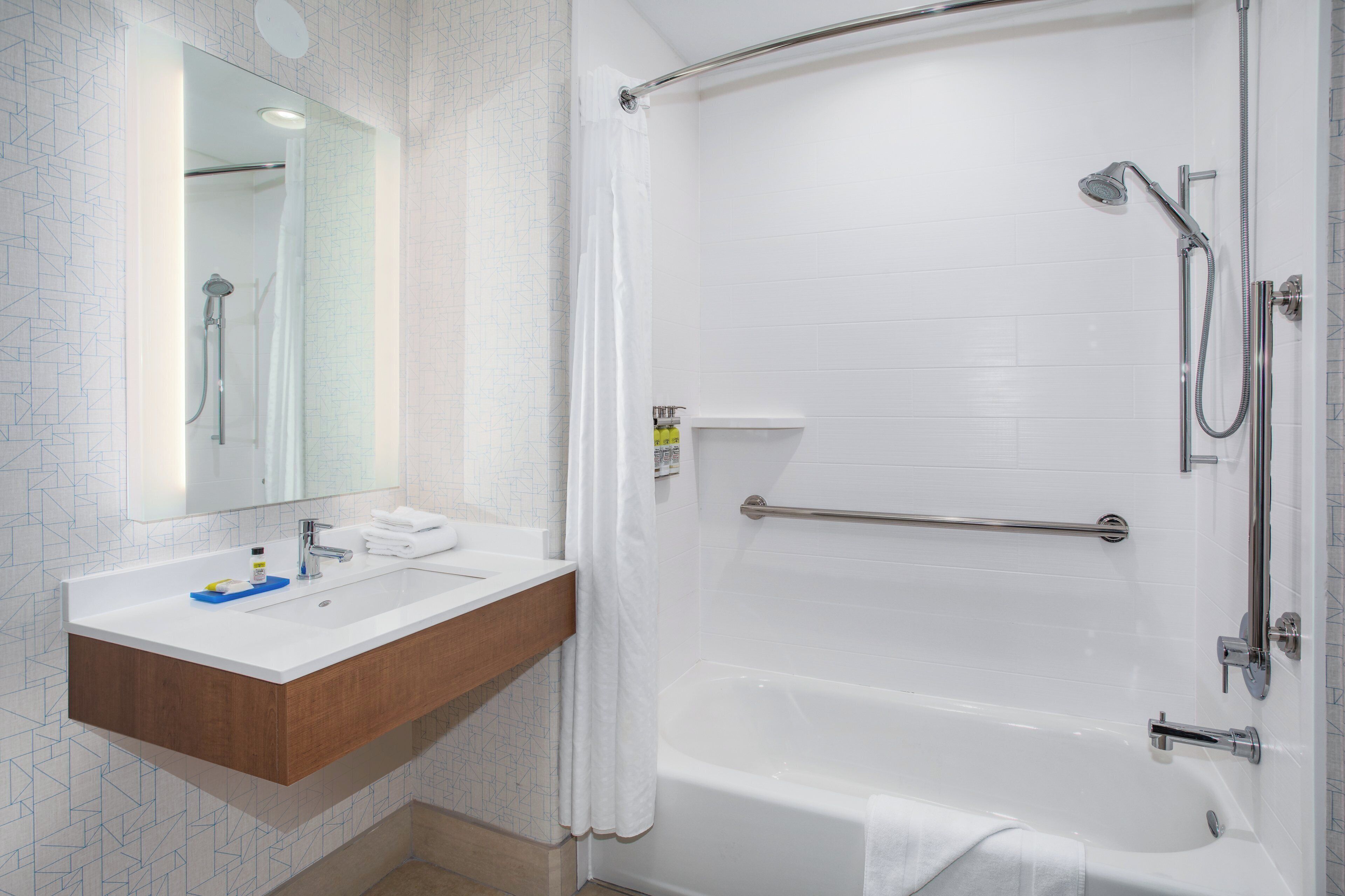 suite, 2 queen beds, accessible (transfer shower) | bathroom | combined shower/bathtub, free toiletries, hair dryer, towels
