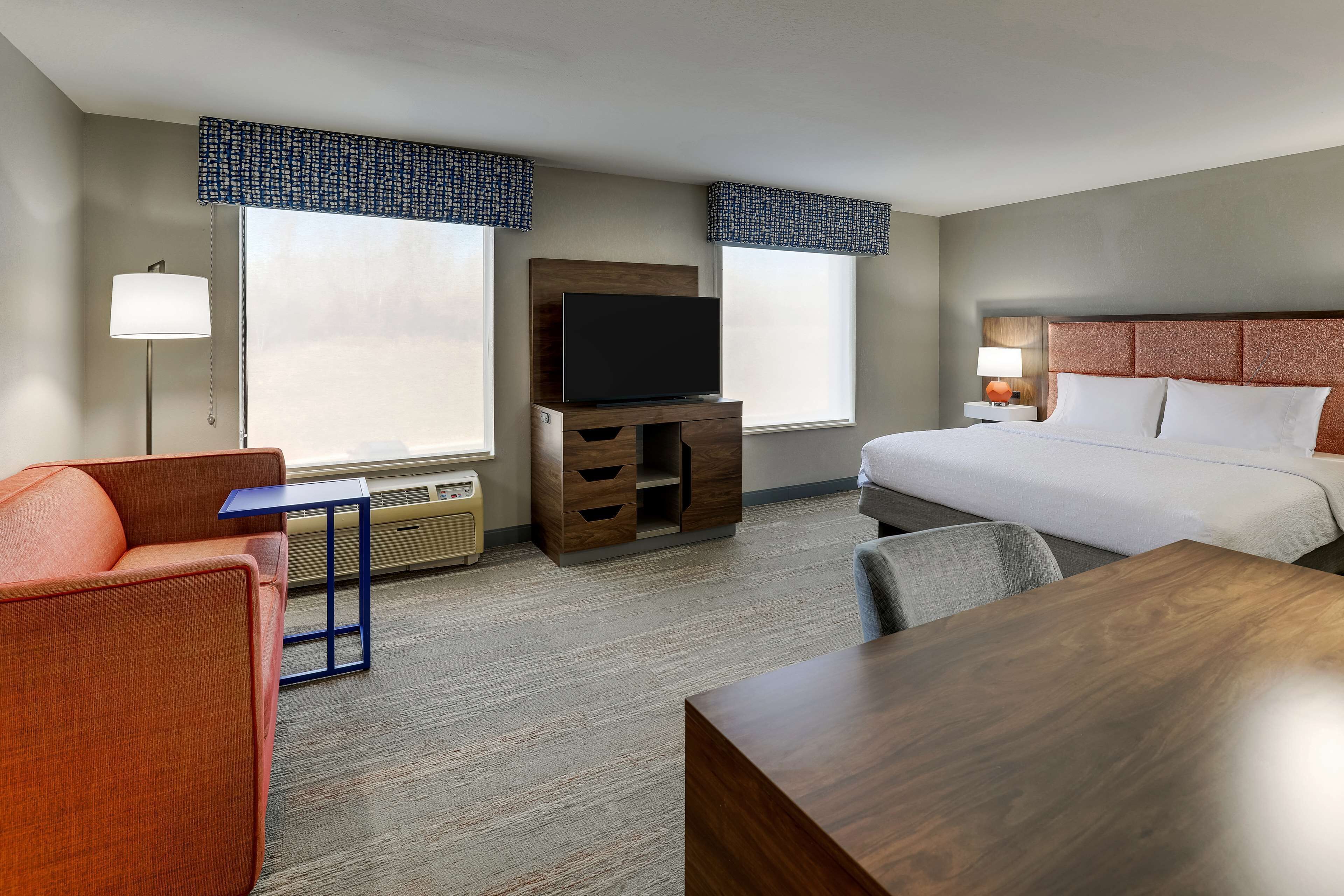 one king studio suite non smoking | living area | 42-inch tv with cable channels, pay films